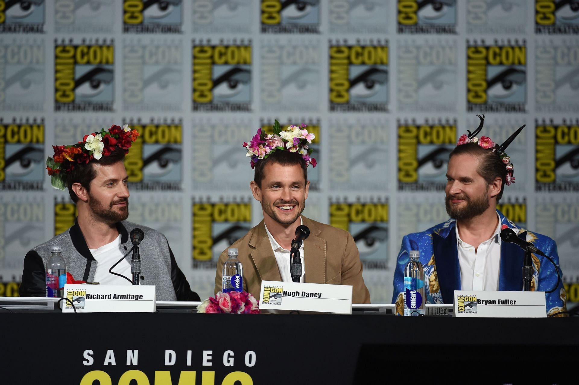 Bryan Fuller (right) with the cast of Hannibal at Comic-Con International 2015 (Image via Getty)